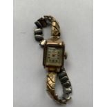 A LADIES TREBEX 7 JEWEL LADIES WRIST WATCH WITH SQUARE FACE