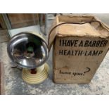 A VINTAGE BOXED BARBER HEALTH LAMP WITH SPARE BULB