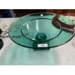 A LARGE GREEN GLASS FRUIT BOWL ON A SQUARE PEDESTAL OVER 30 CM DIAMETER