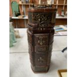 A SINGLE BOTTLE CHEST DEPICTING A BOOKCASE CLASSIC NOVELS TO INCLUDE WAR AND PEACE, OLIVER TWIST,