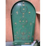 A VINTAGE BAGATELLE BOARD MADE AT CHAD VALLEY WORKS HARBORNE ENGLAND
