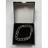A MARKED SILVER GENTS WRIST CHAIN