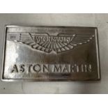 A CHROME ASTON MARTIN SIGN WITH HANGER 29CM LONG