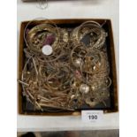 AA BOX OF GOLD METAL COSTUME JEWELLERY TO INCLUDE BANGLES, NECKLACES ETC