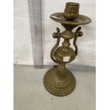 A BRASS SHIPS GIMBLE CANDLE STICK