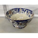 A VICTORIAN FRUIT BOWL WITH A BLUE AND ORANGE FLOWER AND LEAF DESIGN