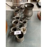A GROUP OF NINE ASSORTED VINTAGE PEWTER TANKARDS OF VARYING SIZES