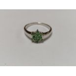 A LADIES 9CT WHITE GOLD GREEN STONE CLUSTER RING, WEIGHT 2.2 GRAMS