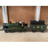 A POSSIBLY BASSETT LOUKE OR SCRATCH BUILT O GAUGE ELECTRIC L.M.S. 1944 GREEN LOCO AND TENDER