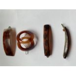 FOUR TORTOISE SHELL HAIR SLIDES THREE RECTANGULAR AND ONE WITH INTERLOCKING CIRCLES