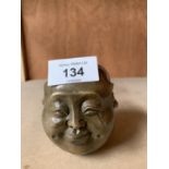 A BRASS FOUR FACRD BUDDHA HEAD