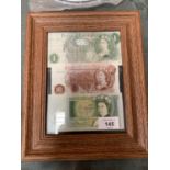 A SET OF THREE FRAMED BANK NOTES TO INCLUDE TWO £1'S AND A 10 SHILLINGS