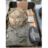 A BOX OF BRITISH ARMY HELMET, T SHIRT, BOTTLE, TROUSERS ETC