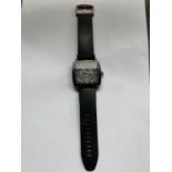 A GENTS BLACK 'POLICE' WATCH WITH SQUARE FACE ALL STAINLESS STEEL 3 ATM WATER RESISTANT WITH BLACK