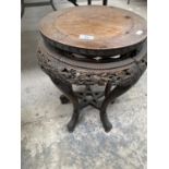 A CHINESE CARVED WOODEN JARDINIERE STAND WITH STAR OF DAVID SHELF DESIGN