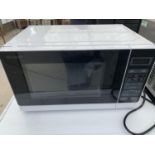 A WHITE MICROWAVE