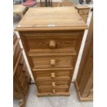 A TALL PINE CHEST OF FIVE DRAWERS