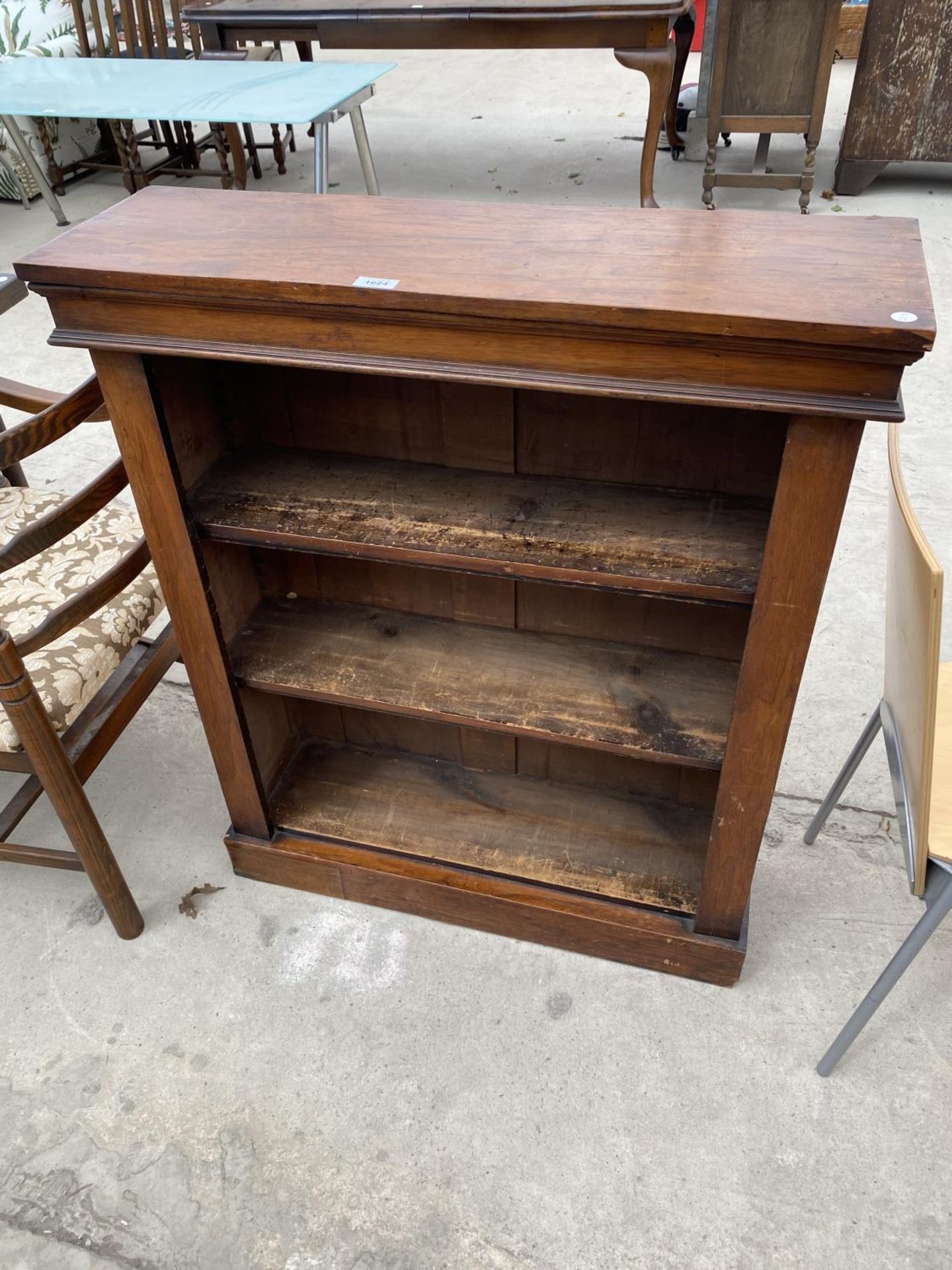 A MAHOGANY THREE TIER BOOKCASE