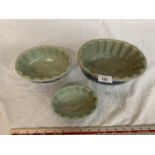 THREE IRONSTONE MOULDS WITH FISH DESIGN IN THE BOTTOM (MIDDLE ONE A/F CHIP ON RIM)