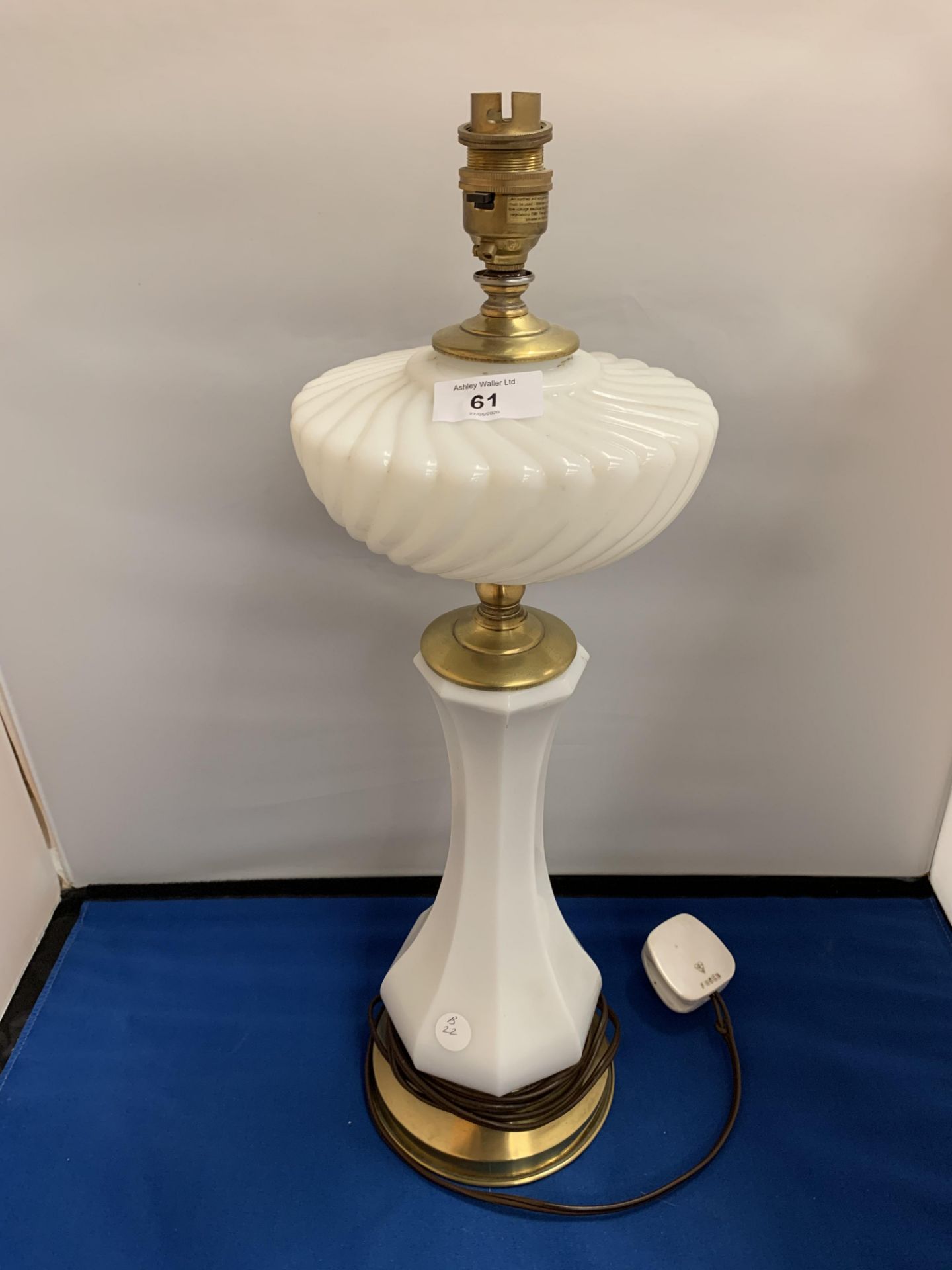 A WHITE MILK GLASS LAMP