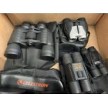 SEVEN PAIRS OF VARIOUS SIZED BINOCULARS SOME WITH CASES TO INCLUDE CELESTRON, PENTACACON, PRAKTICA