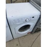 A HOTPOINT AQUARIUS WASHING MACHINE CRACK IN CASING AND IN NEED OF CLEAN IN WORKING ORDER