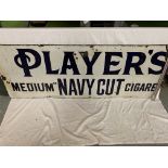 A LARGE ENAMEL JOHN PLAYERS ADVERTISING SIGN WIDTH 169CM X HEIGHT 63.5CM