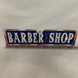 A 'BARBER SHOP' SIGN