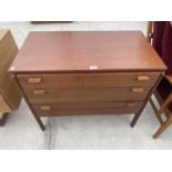 A TEAK CHEST OF THREE DRAWERS