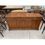 A YEW WOOD SIDEBOARD WITH FOUR DOORS AND THREE DRAWERS