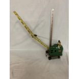 A VINTAGE TIN PLATE TOY CRANE