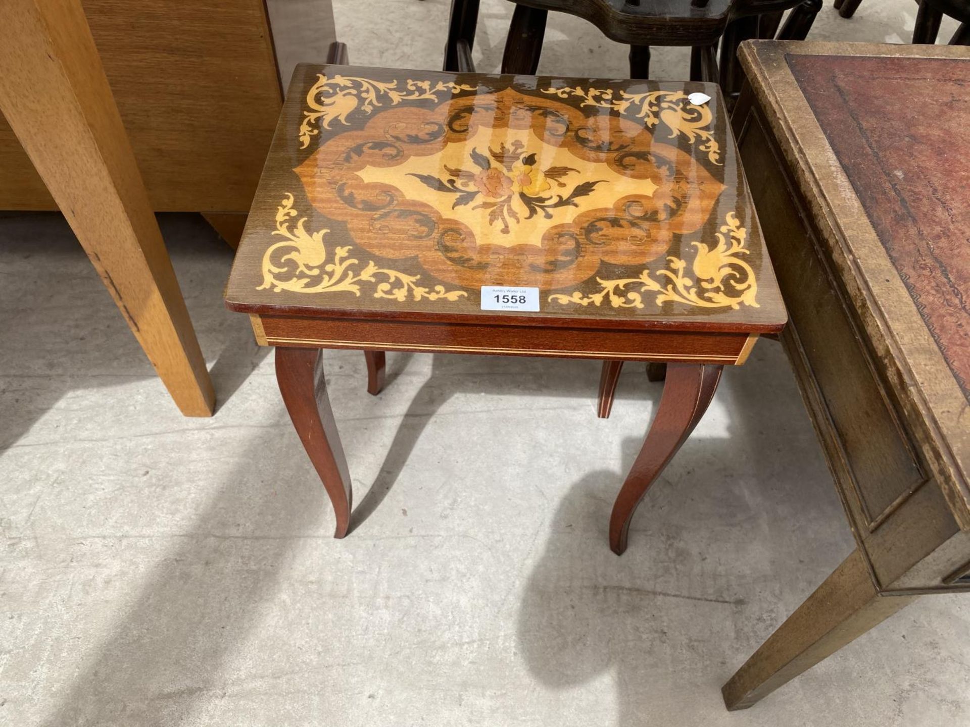 AN ITALIAN INLAID MAHOGANY SEWING TABLE WITH HINGED TOP AND A MAHOGANY COFFEE TABLE