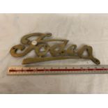 A VINTAGE BRASS FODEN SIGN APPROX 33CM LONG