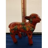 AN ANITA HARRIS HAND PAINTED MODEL OF A LAMB