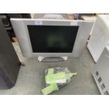 A 15 INCH TELEVISION WITH REMOTE CONTROL IN WORKING ORDER