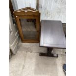 AN OAK FLAT FRONT CORNER CUPBOARD WITH SINGLE GLAZED DOOR AND A SMALL OAK COFFEE TABLE