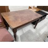 A RECTANGULAR MAHOGANY DINING TABLE