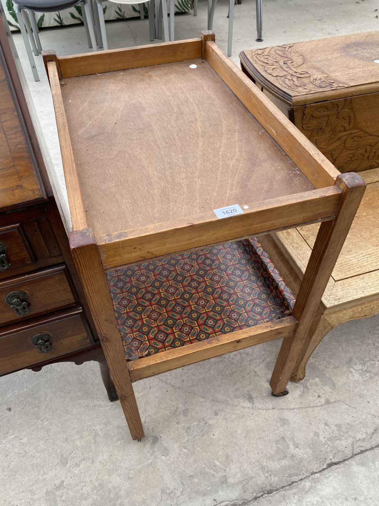 AN OAK TEA TROLLEY