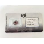 A 3.69 CARAT EMERALD CUT RED BERYL - CLARITY S1. WITH AGI CERTIFICATE OF AUTHENTICITY