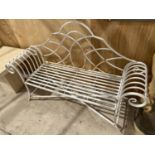 A WHITE PAINTED METAL GARDEN BENCH