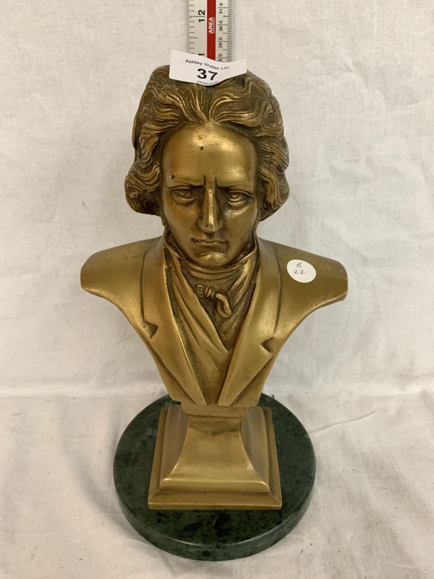 A BUST OF BEETHOVEN ON A MARBLE BASE