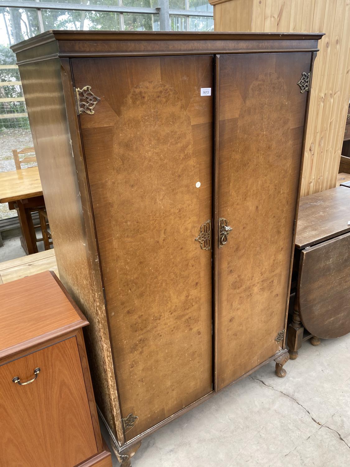 A WALNUT WARDROBE WITH TWO DOORS