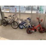 THREE CHILDRENS BICYCLES TO INCLUDE A FALCON, POLICE PATROL AND A LIGHTENING MCQUEEN