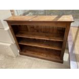 A PINE THREE TIER BOOKCASE