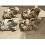 FOUR CONCRETE CHERUB GARDEN ORNAMENTS