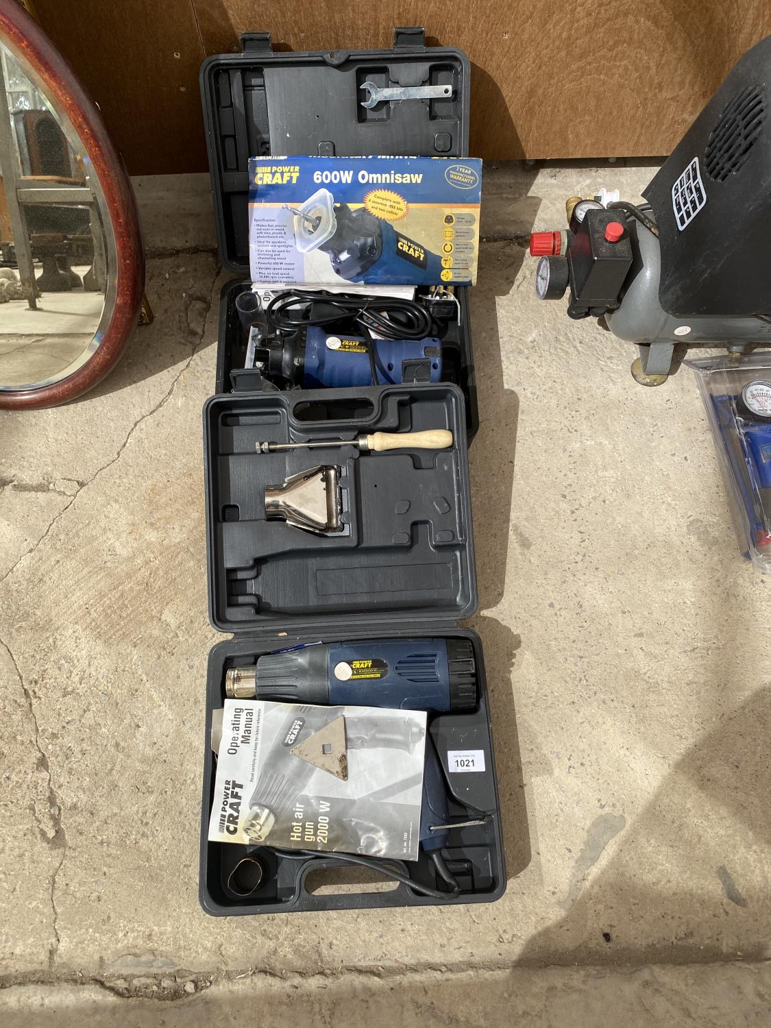 TWO VARIOUS BOXED TOOLS TO INCLUDE A 600W OMNISAW AND A POWERCRAFT HOT AIR GUN - WORKING ORDER