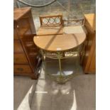 A TEAK DEMI LUNE HALL TABLE ON WROUGHT IRON SUPPORTS, TWO WICKER WHATNOTS AND A SMALL TEAK CABINET