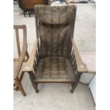 AN OAK ARMCHAIR