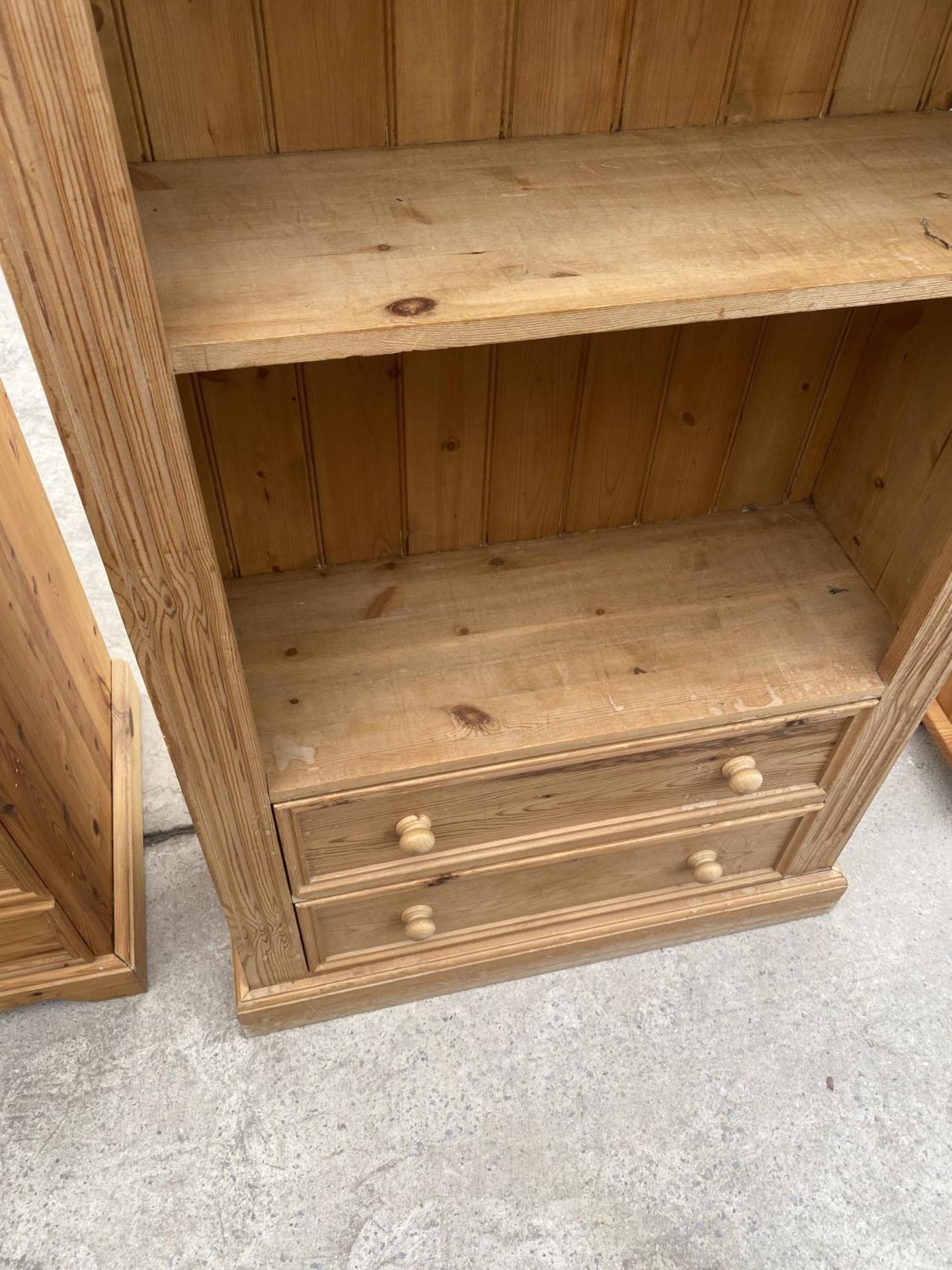 A TALL PINE FOUR TIER BOOKSHELF WITH TWO LOWER DRAWERS - Image 3 of 3