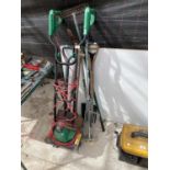 AN ELECTRIC ROTOVATOR IN WORKING ORDER AND VARIOUS GARDEN TOOLS TO INCLUDE A SPADE, FORK, RAKE ETC